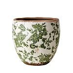 Närbild på Victoria-krukan från Affari of Sweden i vit och grön stengods med ett klassiskt, blommigt mönster och en glaserad finish.