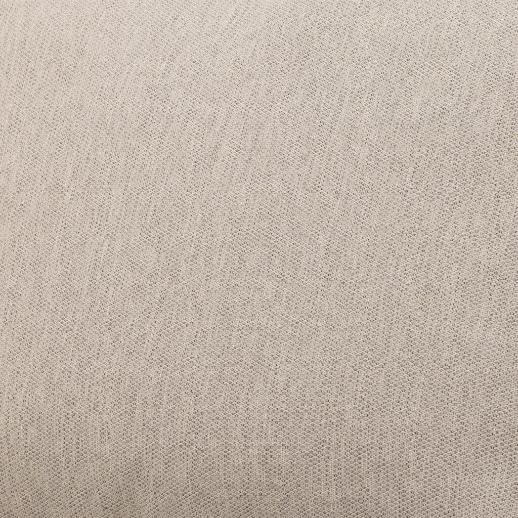 Närbild av beige dynklädsel på Penzano soffa från Bloomingville, med en mjuk och vävd struktur för en stilren och naturlig look.