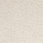 Närbild av det beige tygmaterialet på Lounge Chair Eden Latte från Zuiver, med en mjuk och strukturerad yta.