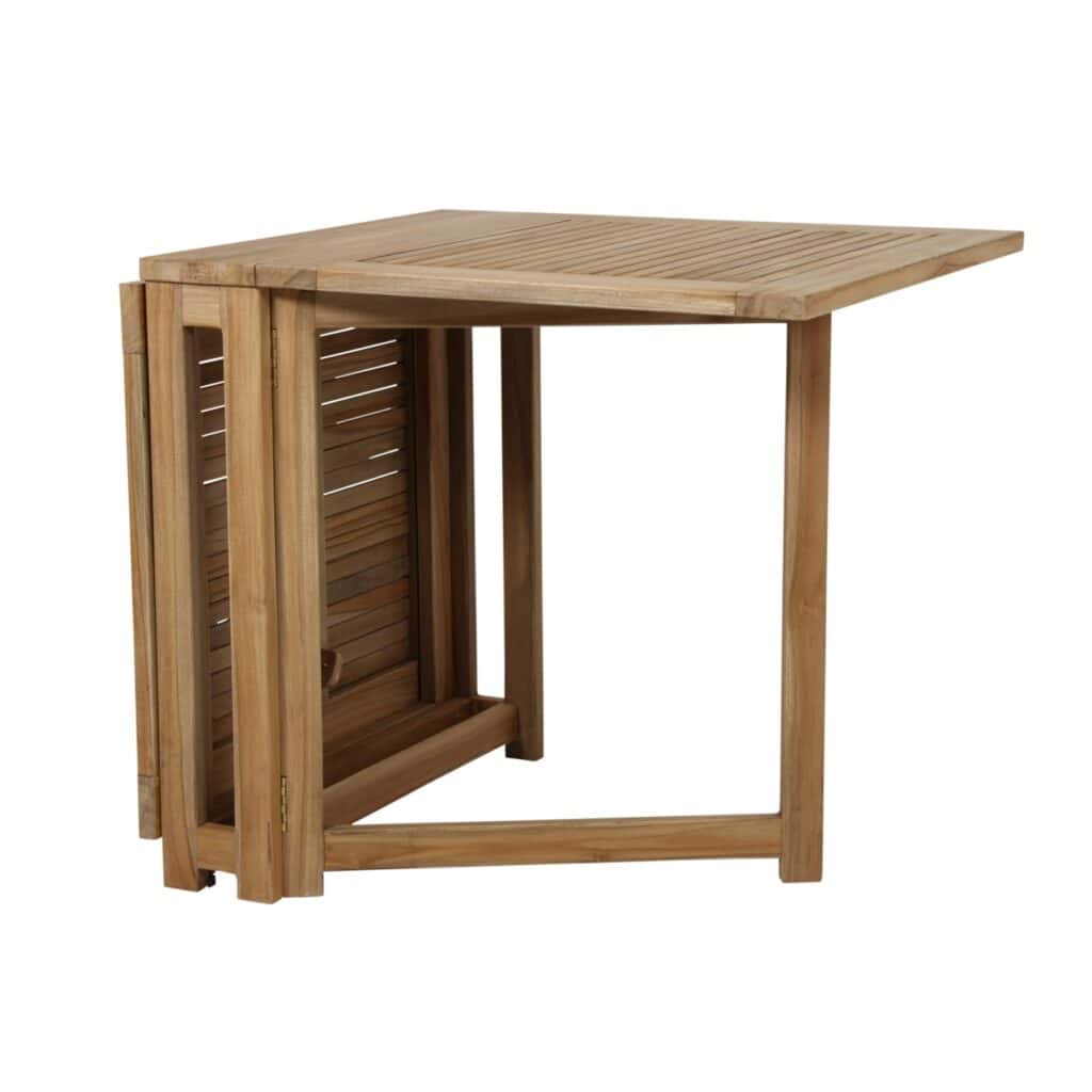 Turin klaffbord i teak från Brafab, delvis utfällt för att visa dess flexibla och platsbesparande design. Perfekt för balkonger och mindre uteplatser.
