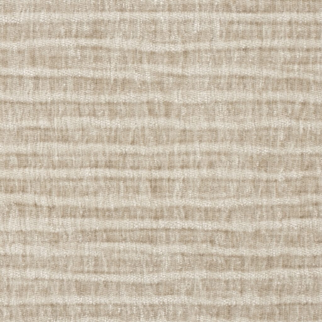 Närbild på sandfärgat strukturtyg med oregelbunden rand – Zuiver Blossom soffa