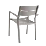 Baksidan av karmstol DELIA i färgen khaki med synliga armstöd och lätt böjd rygg.