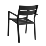 Svart karmstol DELIA från Brafab fotograferad snett bakifrån.