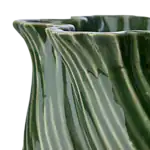 Närbild på TWIST vasens glaserade yta och vridna struktur