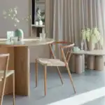 Korsformad bas i MDF på matbord Laurent, designad för maximal stabilitet och modern estetik.