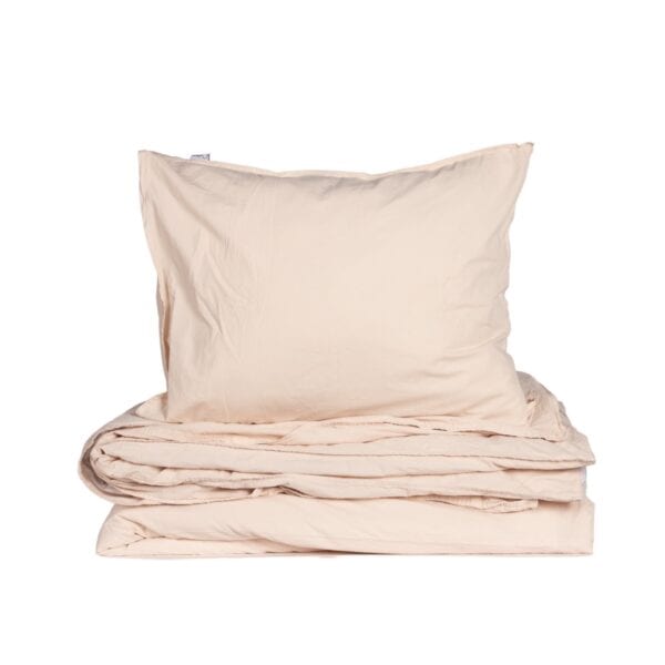 Ekologiskt påslakanset i tvättad bomull Nude Pink från Storefactory, varm beige-rosa ton, med påslakan och örngott i matchande färg