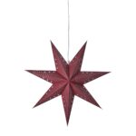 Röd julstjärna i papper med dekorativt hålmönster – UNI julstjärna från Hemlängtan.